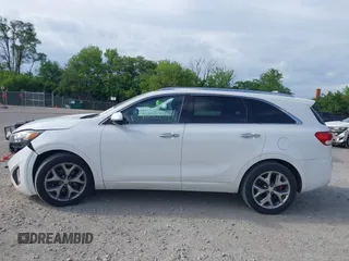 2017 Kia Sorento SXL z VIN 5XYPK4A58HG251610, wystawiony jako IAAI lot #42351313 z przebiegiem 147 527 mil mil oraz . Historia ofert i sprzedaży dostępna na DreamBid. Obrazek 14.