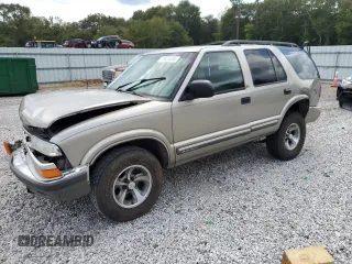 2001 Chevrolet Blazer LT z VIN 1GNCS13W512145867, wystawiony jako Copart lot #71829304 z przebiegiem 358 800 mil mil oraz Szkoda całkowita • Salvage title. Historia ofert i sprzedaży dostępna na DreamBid. Obrazek 1.