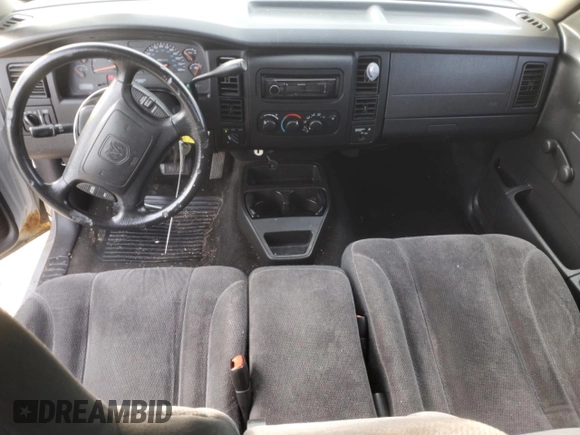 2002 Dodge Dakota z VIN 1B7GG42X22S511194, wystawiony jako Copart lot #42983195 z przebiegiem 131 808 mil mil oraz Szkoda całkowita • Salvage title. Historia ofert i sprzedaży dostępna na DreamBid. Obrazek 8.