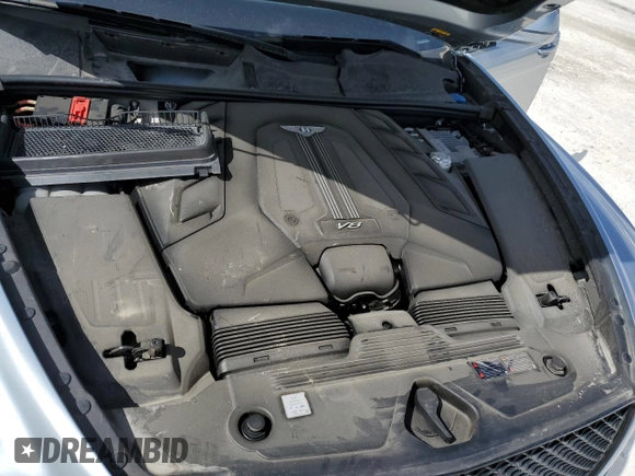 2022 Bentley Bentayga V8 z VIN SJAAM2ZV9NC011752, wystawiony jako Copart lot #79142714 z przebiegiem Nie podano mil oraz Nie do naprawy. Historia ofert i sprzedaży dostępna na DreamBid. Obrazek 12.
