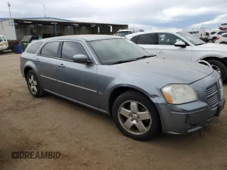 2006 Dodge Magnum SXT with VIN 2D4GZ47V76H473558, listed as a Copart auction lot 72087564 with 122,810 mi miles and Salvage Title. Bid and sale history available at DreamBid. Image 4.