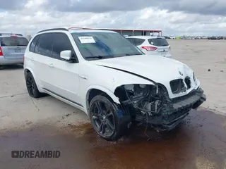 2012 BMW X5 M with VIN 5YMGY0C53CLK27644, listed as a IAAI auction lot 41180114 with 76,805 mi miles. Bid and sale history available at carsss.com. Image 1.