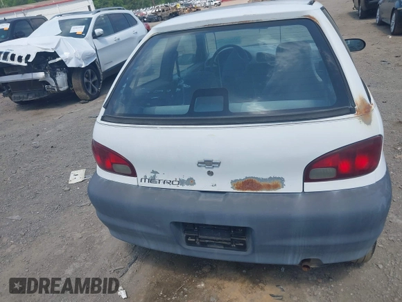 1998 Chevrolet Metro with VIN 2C1MR2262W6706873, listed as a IAAI auction lot 42052809 with 142,302 mi miles and . Bid and sale history available at DreamBid. Image 6.