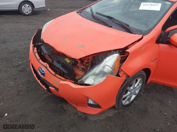 2013 Toyota Prius c One with VIN JTDKDTB35D1051287, listed as a IAAI auction lot 41678057 with 148,214 mi miles. Bid and sale history available at carsss.com. Image 6.