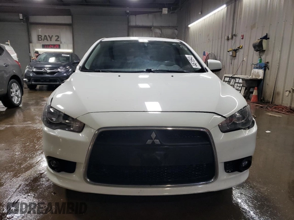 2014 Mitsubishi Lancer GT with VIN JA32U8FWXEU023131, listed as a Copart auction lot 44616945 with 84,977 mi miles and Salvage Title. Bid and sale history available at carsss.com. Image 5.