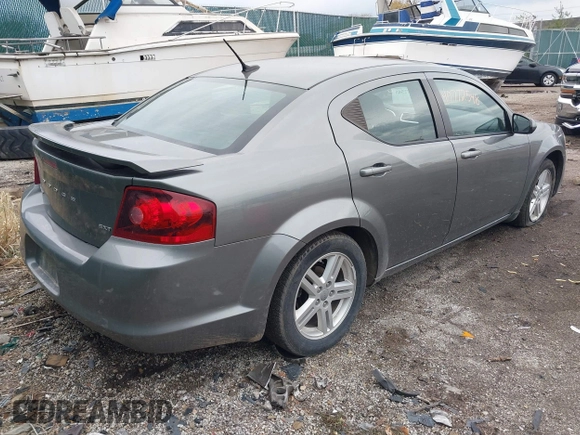 2013 Dodge Avenger SXT z VIN 1C3CDZCG0DN521540, wystawiony jako IAAI lot #40772548 z przebiegiem 145 455 mil mil oraz . Historia ofert i sprzedaży dostępna na DreamBid. Obrazek 4.