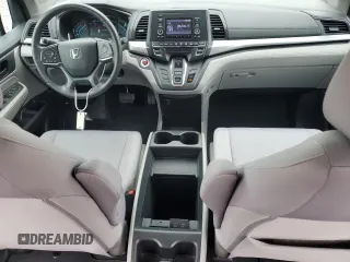 2019 Honda Odyssey LX с VIN 5FNRL6H2XKB129150, выставлен на аукционе Copart как лот 57839255 с пробегом 59 244 миль миль и Списание • Salvage title. История ставок и продаж доступна на DreamBid. Изображение 8.