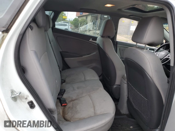 2015 Hyundai Accent Sport with VIN KMHCU5AEXFU220171, listed as a Copart auction lot 72114734 with 170,372 mi miles and Salvage Title. Bid and sale history available at carsss.com. Image 10.