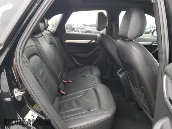 2015 Audi Q3 Premium Plus z VIN WA1BFCFS9FR002457, wystawiony jako Copart lot #87422994 z przebiegiem 135 890 mil mil oraz Szkoda całkowita • Salvage title. Historia ofert i sprzedaży dostępna na DreamBid. Obrazek 10.
