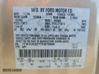 2007 Ford Escape XLS with VIN 1FMYU02Z77KB76668, listed as a Copart auction lot 73338784 with 166,759 mi miles and Salvage Title. Bid and sale history available at carsss.com. Image 14.