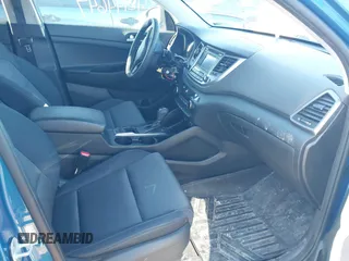 2018 Hyundai Tucson SE z VIN KM8J2CA40JU792495, wystawiony jako IAAI lot #42144647 z przebiegiem 62 769 mil mil oraz . Historia ofert i sprzedaży dostępna na DreamBid. Obrazek 5.