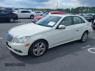 2011 Mercedes-Benz E-Class E 350 Luxury with VIN WDDHF8HB0BA422696, listed as a IAAI auction lot 42006732 with 147,653 mi miles. Bid and sale history available at carsss.com. Image 2.