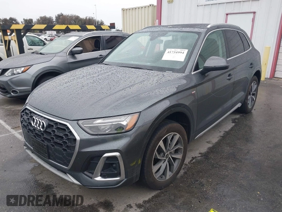 2023 Audi Q5 S line Premium Plus z VIN WA1EAAFY7P2178566, wystawiony jako IAAI lot #41734994 z przebiegiem Nie podano mil oraz . Historia ofert i sprzedaży dostępna na DreamBid. Obrazek 2.