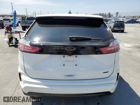2022 Ford Edge SE with VIN 2FMPK4G99NBA21161, listed as a Copart auction lot 61103195 with 39,859 mi miles and Salvage title. Bid and sale history available at DreamBid. Image 6.