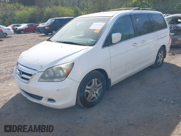 2006 Honda Odyssey EX-L z VIN 5FNRL387X6B452405, wystawiony jako IAAI lot #41884680 z przebiegiem 333 366 mil mil oraz . Historia ofert i sprzedaży dostępna na DreamBid. Obrazek 2.