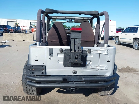 2002 Jeep Wrangler X with VIN 1J4FA39S42P763835, listed as a IAAI auction lot 42302645 with 233,634 mi miles and . Bid and sale history available at DreamBid. Image 17.
