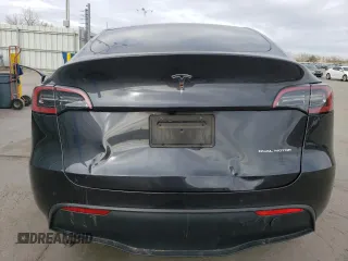 2024 Tesla Model Y Long Range with VIN 7SAYGAEE5RF038446, listed as a Copart auction lot 48868025 with 10,410 mi miles and Salvage Title. Bid and sale history available at DreamBid. Image 6.