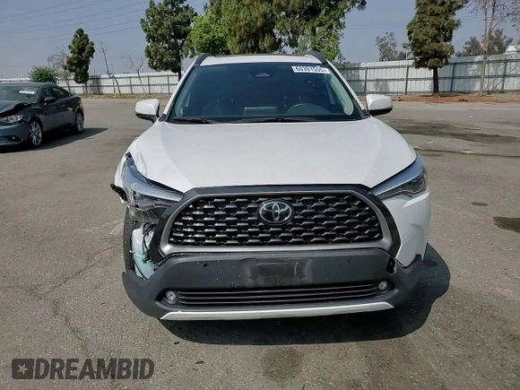 2023 Toyota Corolla Cross XLE with VIN 7MUDAAAG2PV042957, listed as a Copart auction lot 60301555 with 39,211 mi miles and Salvage title. Bid and sale history available at DreamBid. Image 14.