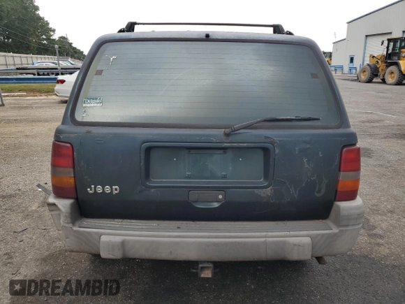 1995 Jeep Grand Cherokee Laredo with VIN 1J4FX58S0SC726476, listed as a Copart auction lot 69608784 with 264,705 mi miles and Salvage Title. Bid and sale history available at carsss.com. Image 6.