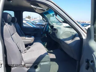 2002 Ford F-150 XL with VIN 1FTRX07242KA59876, listed as a IAAI auction lot 42673613 with 85,536 mi miles and . Bid and sale history available at DreamBid. Image 5.