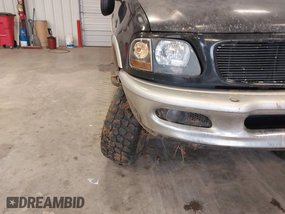 1998 Ford F-150 XL with VIN 1FTRX08L6WKA88552, listed as a IAAI auction lot 41549860 with 141,247 mi miles and . Bid and sale history available at DreamBid. Image 6.