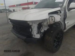 2022 Chevrolet Tahoe LT with VIN 1GNSKNKD5NR143276, listed as a IAAI auction lot 42268541 with 54,463 mi miles and . Bid and sale history available at DreamBid. Image 6.