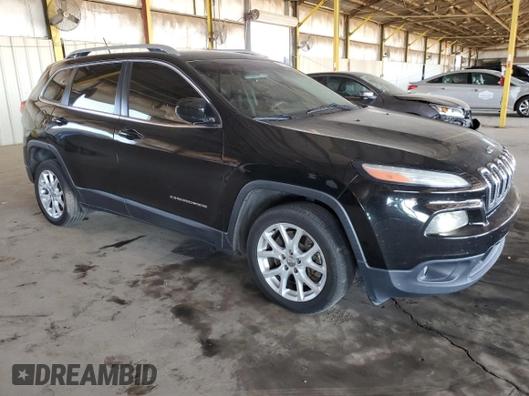 2018 Jeep Cherokee Latitude with VIN 1C4PJLCX6JD531185, listed as a Copart auction lot 61922815 with 246,133 mi miles and Salvage title. Bid and sale history available at DreamBid. Image 4.