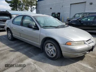 1997 Dodge Stratus z VIN 1B3EJ56H0VN679440, wystawiony jako Copart lot #71977454 z przebiegiem 83 367 mil mil oraz Tytuł czysty. Historia ofert i sprzedaży dostępna na DreamBid. Obrazek 4.