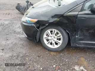 2010 Honda Insight EX z VIN JHMZE2H79AS010908, wystawiony jako IAAI lot #42263658 z przebiegiem 140 999 mil mil oraz . Historia ofert i sprzedaży dostępna na DreamBid. Obrazek 6.