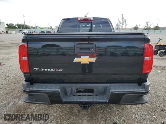 2018 Chevrolet Colorado z VIN 1GCHSDEN1J1251680, wystawiony jako Copart lot #76588774 z przebiegiem 83 630 mil mil oraz Szkoda całkowita • Salvage title. Historia ofert i sprzedaży dostępna na DreamBid. Obrazek 6.