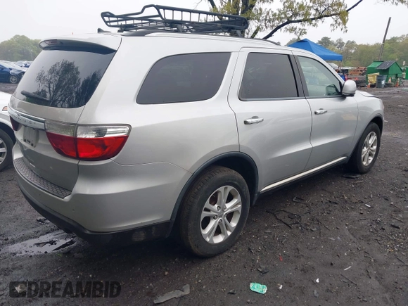 2013 Dodge Durango Crew with VIN 1C4SDJDT8DC565608, listed as a IAAI auction lot 42181773 with 161,485 mi miles and . Bid and sale history available at DreamBid. Image 4.