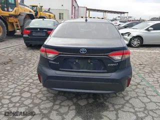 2020 Toyota Corolla Hybrid LE with VIN JTDEBRBE8LJ022596, listed as a IAAI auction lot 41772107 with 49,563 mi miles. Bid and sale history available at carsss.com. Image 16.