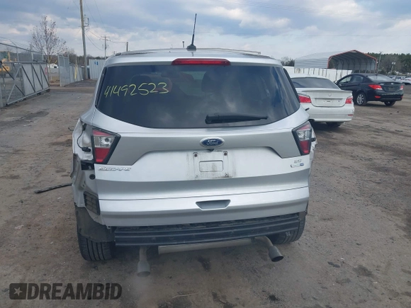 2017 Ford Escape SE z VIN 1FMCU9GDXHUA46689, wystawiony jako IAAI lot #41492523 z przebiegiem 67 401 mil mil oraz . Historia ofert i sprzedaży dostępna na DreamBid. Obrazek 18.