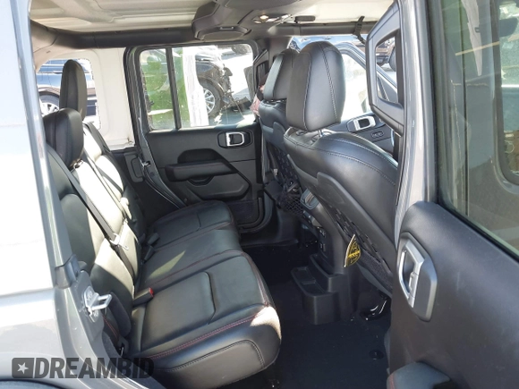 2020 Jeep Wrangler Unlimited Rubicon with VIN 1C4HJXFN4LW136516, listed as a IAAI auction lot 41874403 with 87,576 mi miles. Bid and sale history available at carsss.com. Image 8.