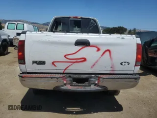 1999 Ford F-150 with VIN 1FTZX1727XKA70271, listed as a Copart auction lot 58016095 with 219,093 mi miles and Salvage title. Bid and sale history available at DreamBid. Image 6.
