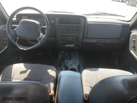 2001 Jeep Cherokee Sport with VIN 1J4FF48S71L574658, listed as a Copart auction lot 49113215 with 208,626 mi miles and Salvage Title. Bid and sale history available at carsss.com. Image 8.