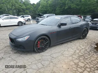 2014 Maserati Ghibli S Q4 with VIN ZAM57RTA1E1113706, listed as a Copart auction lot 54848315 with 113,254 mi miles and Clean title. Bid and sale history available at DreamBid. Image 1.