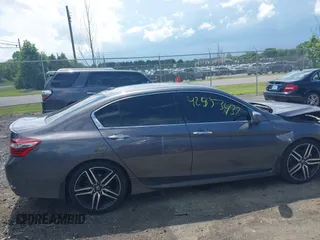 2017 Honda Accord Touring with VIN 1HGCR3F98HA015928, listed as a IAAI auction lot 42553437 with 168,902 mi miles and . Bid and sale history available at DreamBid. Image 13.