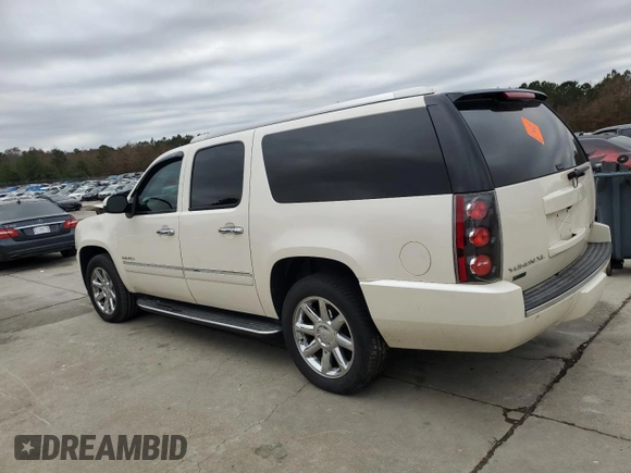 2012 GMC Yukon XL Denali with VIN 1GKS2MEF5CR284219, listed as a Copart auction lot 85585714 with 202,387 mi miles and Salvage Title. Bid and sale history available at carsss.com. Image 2.