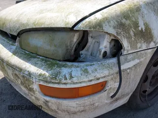 1994 Geo Prizm z VIN 1Y1SK5363RZ020392, wystawiony jako IAAI lot #42023319 z przebiegiem 260 533 mil mil oraz . Historia ofert i sprzedaży dostępna na DreamBid. Obrazek 11.