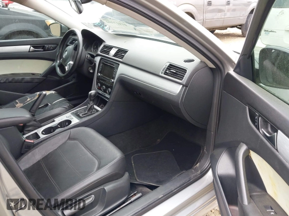 2013 Volkswagen Passat SE w/Sunroof & Nav with VIN 1VWBP7A30DC112563, listed as a IAAI auction lot 41917390 with 222,008 mi miles. Bid and sale history available at carsss.com. Image 5.