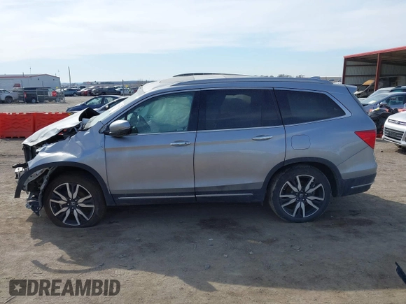 2021 Honda Pilot Elite with VIN 5FNYF6H00MB085678, listed as a IAAI auction lot 41783075 with Not Provided miles and . Bid and sale history available at DreamBid. Image 14.