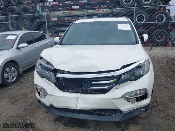 2017 Honda Pilot EX-L with VIN 5FNYF5H52HB020410, listed as a IAAI auction lot 41868625 with 161,702 mi miles. Bid and sale history available at carsss.com. Image 12.
