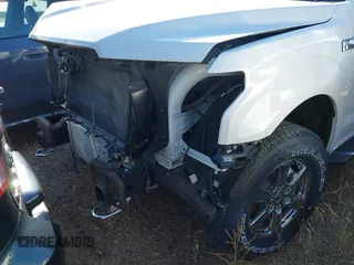 2019 Ford F-150 XL with VIN 1FTEW1EP7KFC62954, listed as a IAAI auction lot 27603731 with 14 mi miles and . Bid and sale history available at DreamBid. Image 14.