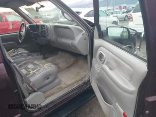 1997 GMC Yukon with VIN 1GKEK13R0VJ755574, listed as a IAAI auction lot 41158932 with 212,668 mi miles. Bid and sale history available at carsss.com. Image 5.