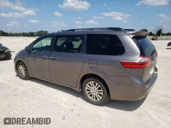 2015 Toyota Sienna XLE with VIN 5TDYK3DC4FS629558, listed as a Copart auction lot 64062045 with 172,669 mi miles and Clean title. Bid and sale history available at DreamBid. Image 2.