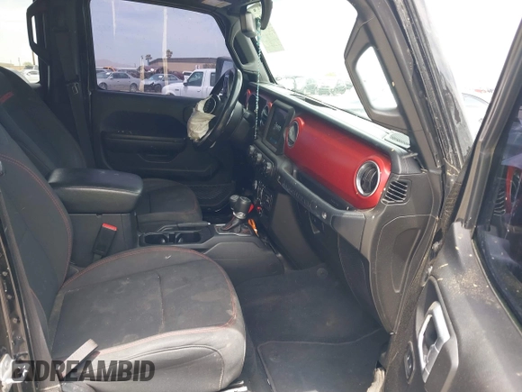 2022 Jeep Wrangler Unlimited Rubicon with VIN 1C4HJXFN2NW134024, listed as a IAAI auction lot 42248188 with 41,899 mi miles and . Bid and sale history available at DreamBid. Image 5.