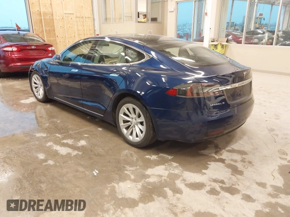 2018 Tesla Model S 75D with VIN 5YJSA1E24JF276044, listed as a IAAI auction lot 41798530 with 53,462 mi miles and . Bid and sale history available at DreamBid. Image 3.