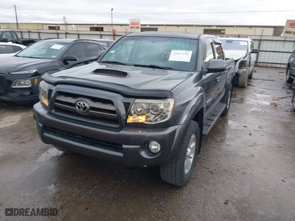 2009 Toyota Tacoma with VIN 3TMLU42N09M034743, listed as a IAAI auction lot 41467696 with 129,395 mi miles. Bid and sale history available at carsss.com. Image 2.