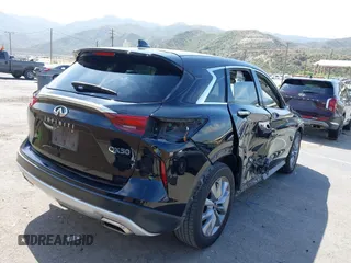 2022 Infiniti QX50 Pure z VIN 3PCAJ5AA4NF107602, wystawiony jako IAAI lot #42147112 z przebiegiem 60 872 mil mil oraz . Historia ofert i sprzedaży dostępna na DreamBid. Obrazek 4.